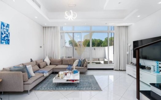 Welcome to your dream home in the vibrant Jumeirah Village Triangle (JVT) community. This stunning 3-bedroom townhouse