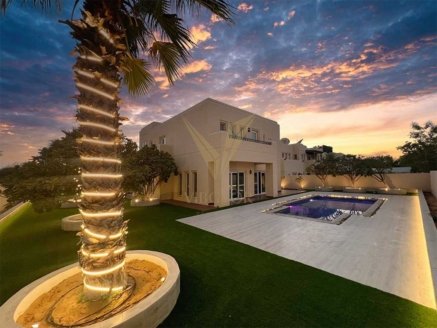 Discover luxury living in this stunning 5-bedroom + Maid's