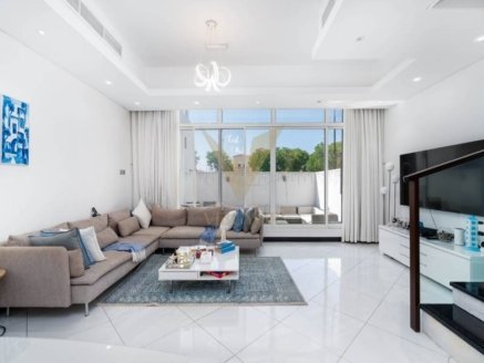 Welcome to your dream home in the vibrant Jumeirah Village Triangle (JVT) community. This stunning 3-bedroom townhouse