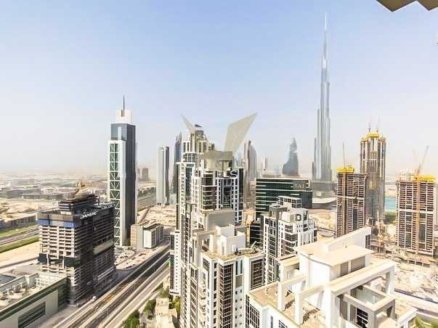 Step into elevated living with this exceptional 4-bedroom penthouse in the iconic Executive Tower