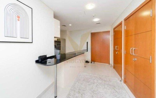 Step into luxury living with this spacious and fully furnished 1-bedroom apartment located in the iconic Ocean Heights Tower